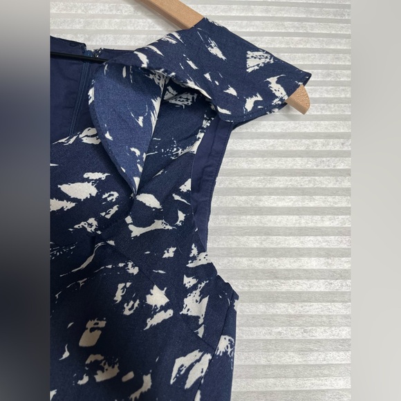 MOON RIVER Navy &
White Print Ruffle Trim
Romantic Romper Size L - Picture 6 of 11